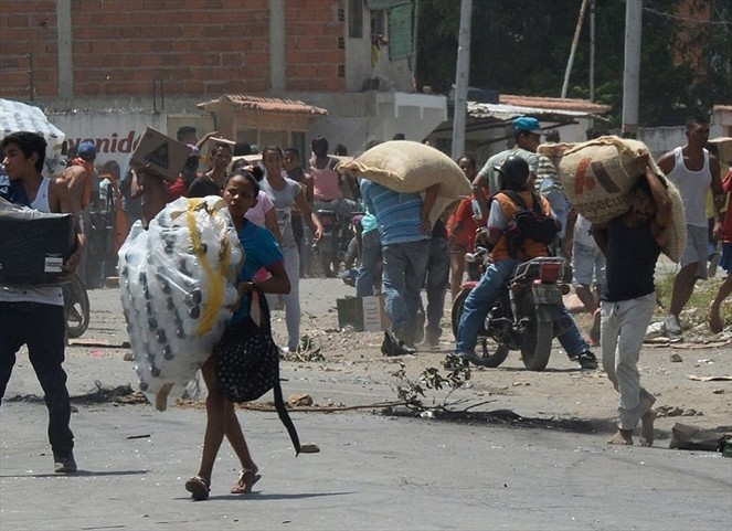 Noticia Radio Panamá | Pérdidas millonarias dejan saqueos registrados en Venezuela